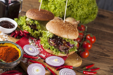 Fresh burger closeup on wooden desk background