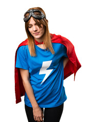 Pretty superhero girl with back pain