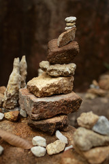 Fototapeta na wymiar Stones pyramid,balance and wellness spa concept, zen like and well being tranquil composition.