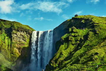 famous Skogarfoss waterfall in southern Iceland. treking in Iceland. Travel and landscape photography concept