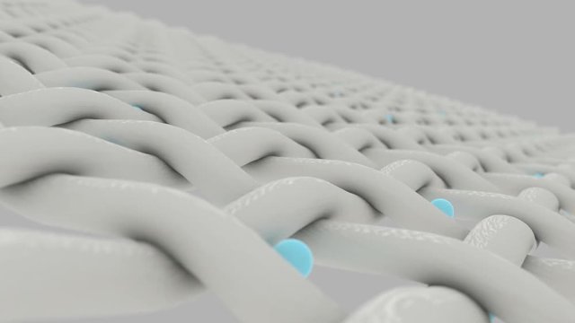 An extreme microscopic closeup pan of fabric being penetrated by white molecules on an isolated background