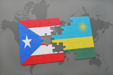 puzzle with the national flag of puerto rico and rwanda on a world map