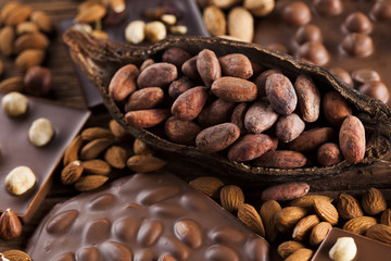 Bars Chocolate , candy sweet, dessert food on wooden background