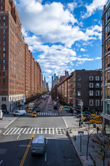 Fototapeta na wymiar Street traffic and buildings in Chelsea - New York, USA