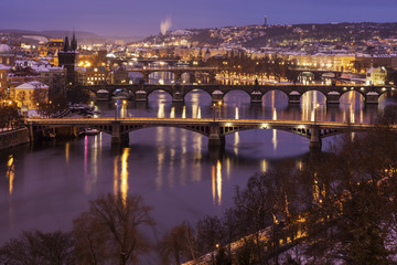 Obraz premium Winter in Prague - bridges on Vltava River