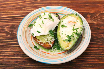 Sandwich with avocado and a fried egg