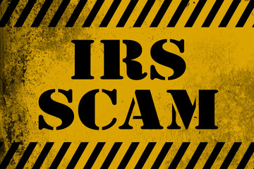 IRS scam sign yellow with stripes - obrazy, fototapety, plakaty