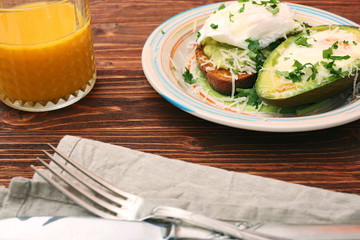 Sandwich with avocado and a fried egg