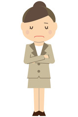 かわいいアップのビジネスウーマン　ベージュのスーツの女性　悩む
