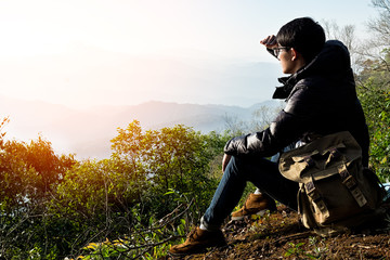 Man Traveler and backpack hiking outdoor Travel Lifestyle and Adventure concept.