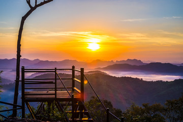 Beautiful Viewpoint and Sunrise with mist, sky and cloud view from top mountain at Phu Bo Bit, Loei, Thailand
