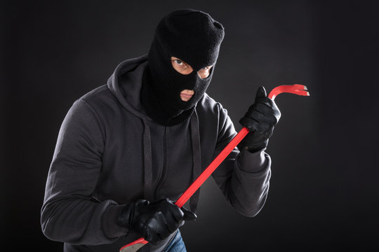 Portrait Of A Burglar With A Crowbar