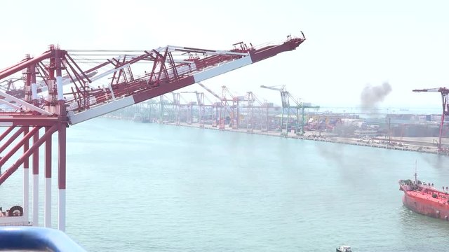 A oil tanker ship designed for the bulk transport of oil. The port of Kaohsiung, the largest harbor in Taiwan. 4K