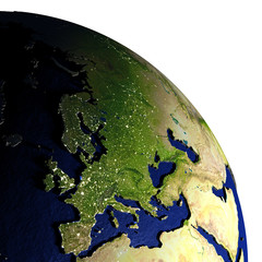 Europe at night on model of Earth with embossed land