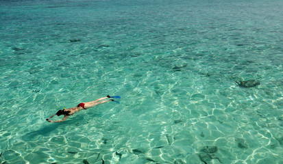 alone snorkeling in maldives