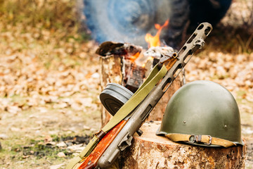 Submachine gun Shpagin and helmet 