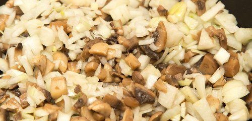 Fototapeta premium mushrooms fried in a pan