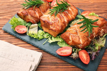 Homemade smoked ham on a board