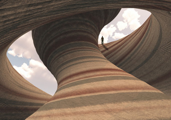 man on carved canyon rock with cloudy sky