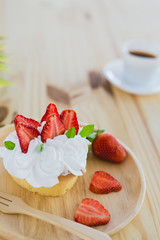 Homemade cake, fresh,  and delicious dessert with juicy strawberries, sweet whipped cream