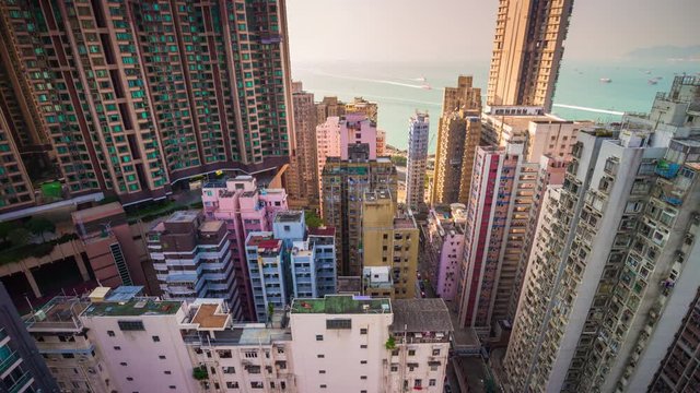 sunset light hong kong city buildings rooftop living block panorama 4k time lapse china

