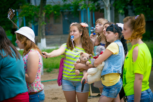 high school students behave like children. Funny children's clothing, childhood Week graduates Slavonic schools. end of the school year in Russian schools. Have fun spending time together
