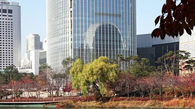 4K of The Lotte World Tower Korea's Tallest Building with blue sky, Lotteworldtower is the tallest building in South Korea
