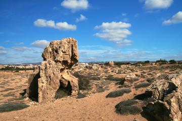 Fototapeta na wymiar Ancient stones in Pafos archaeological park at Kato