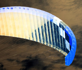 Parachute in the sky. Inversion