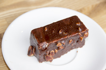 Portion of chocolate cake on plate