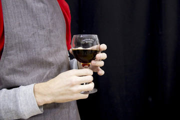 half cup of coffee in hands of barista