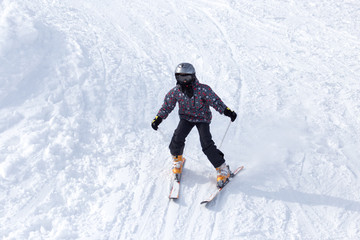Fototapeta na wymiar Boy skiing in the winter