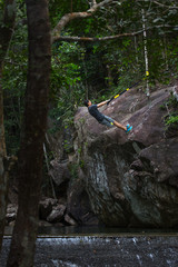 Suspension training with fitness straps outdoors in the nature