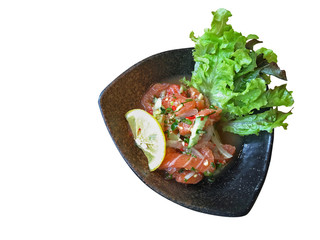 Salmon spicy salad, Thai style Japanese food isolated on white background, clipping path included.