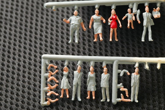 An old and dirty plastic unpainted miniature figure scale model represent the train toy accessory for hobby and collection concept related idea.