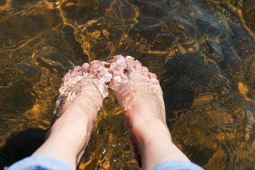 Soak the foot in the  river.
