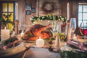 Roasted turkey on holiday table - obrazy, fototapety, plakaty