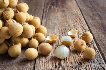 longan fruit on wood table brown with copy space