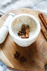 stone mortar for spices: cinnamon and star anise