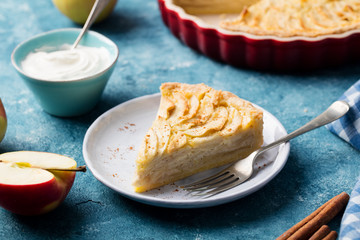 Apple pie on a blue background. Copy space