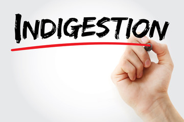 Hand writing indigestion with marker, concept background