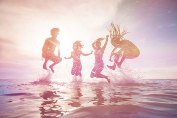 young people having fun in the sea