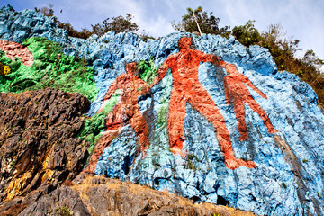 Prehistorical mural (Mirador) in Valle de Vinales, Cuba © Lena Wurm