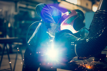 Welding steel with sparks using mig mag welder 