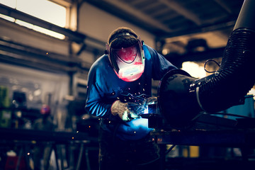 Welding steel with sparks using mig mag welder 