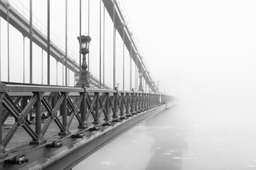 The Chain Bridge in Budapest in a foggy morning, Hungary.