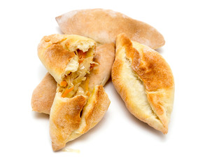 pies with cabbage on a white background