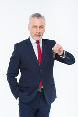 Businessman holding keys