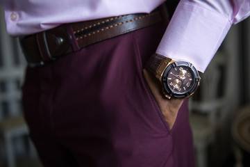 Groom wears a wedding ceremony. groom accessories. Hand of the groom and the watch