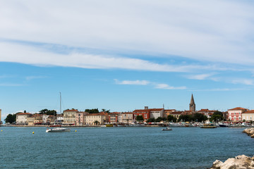 Fototapeta na wymiar View of the old district, basilica and the bay of Porec, old Adriatic town in Croatia